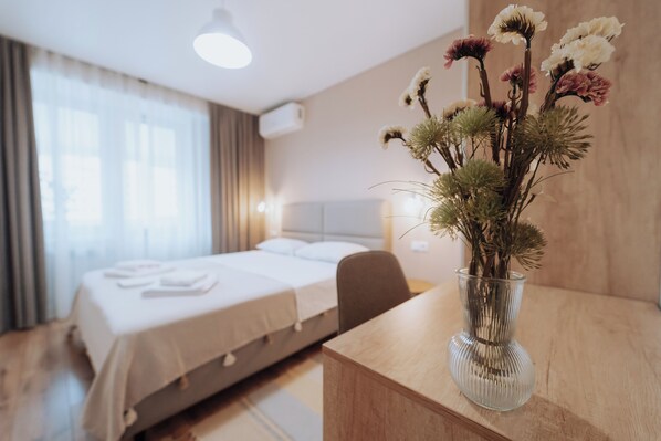 1 bedroom, desk, iron/ironing board, travel crib