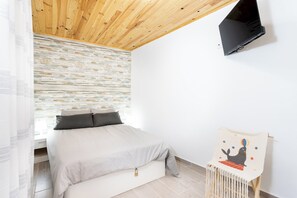 1 slaapkamer, een strijkplank/strijkijzer, wifi, beddengoed