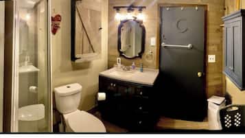 Shower, towels, soap, toilet paper