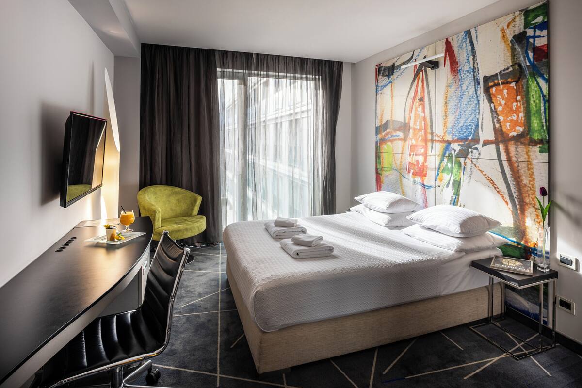 Economy Double Room | Minibar, desk, laptop workspace, soundproofing