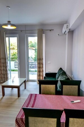 Appartement | Woonruimte | Een flatscreentelevisie