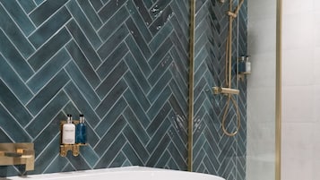 Superior Room | Bathroom | Hair dryer, towels, soap, shampoo