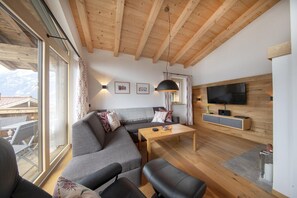 Chalet | Woonruimte | Een open haard