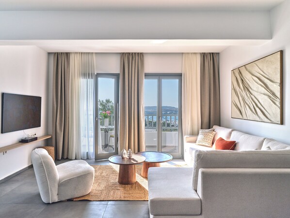 Signature Apartment, Sea View | Living area | Smart TV - Parousia Luxury Apartments (Paros)