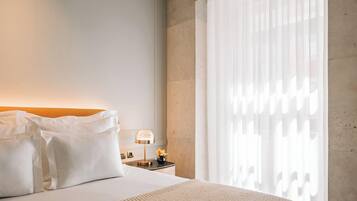 Deluxe Room, City View | Premium bedding, in-room safe, desk, laptop workspace