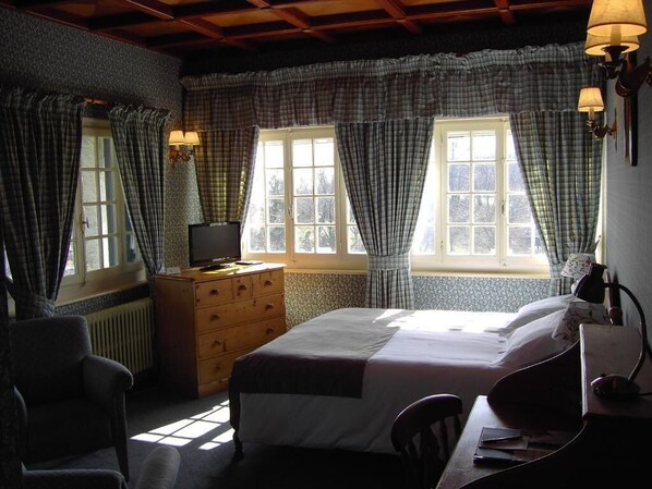 Suite | Een kluis op de kamer, verduisterende gordijnen, geluiddichte muren