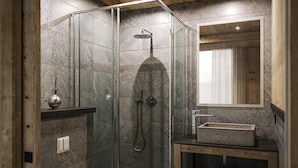 A modern bathroom with a glass-enclosed shower, a wooden vanity, and a large mirror. - Chalet, wifi, sauna, terrace, fireplace or stove, parking, tv, ski locker, 250m², Les 2 Alpes (Les Deux Alpes)