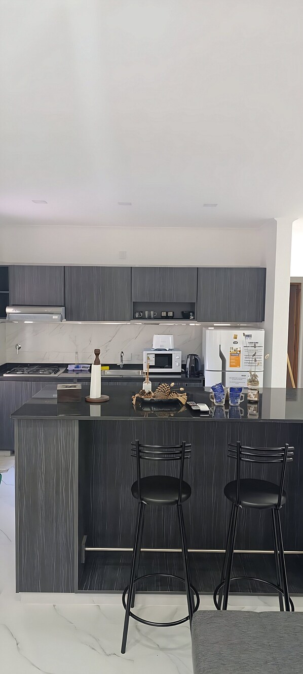 Fridge, microwave, oven, coffee/tea maker