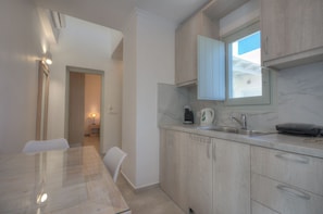 Comfort Apartment | Private kitchen | Fridge, oven, stovetop, cookware/dishes/utensils - Erato City House (Santorini)