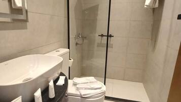 Shower, free toiletries, hair dryer, slippers