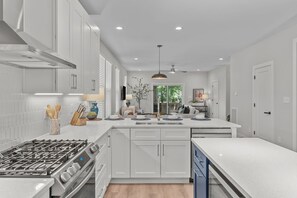 Fridge, microwave, oven, stovetop - Designer Home w/ Luxury Bedding Outside Seating and Fenced Yard (Raleigh)