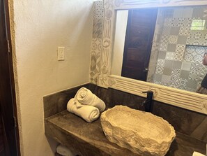 Shower, towels, soap, toilet paper