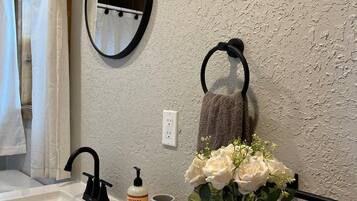 Hair dryer, bidet, towels, soap
