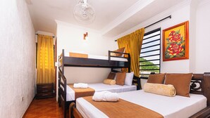 A hotel room with two beds, wooden furniture, a painting, and a window with curtains. - Hotel Med Cartagena (Cartagena)