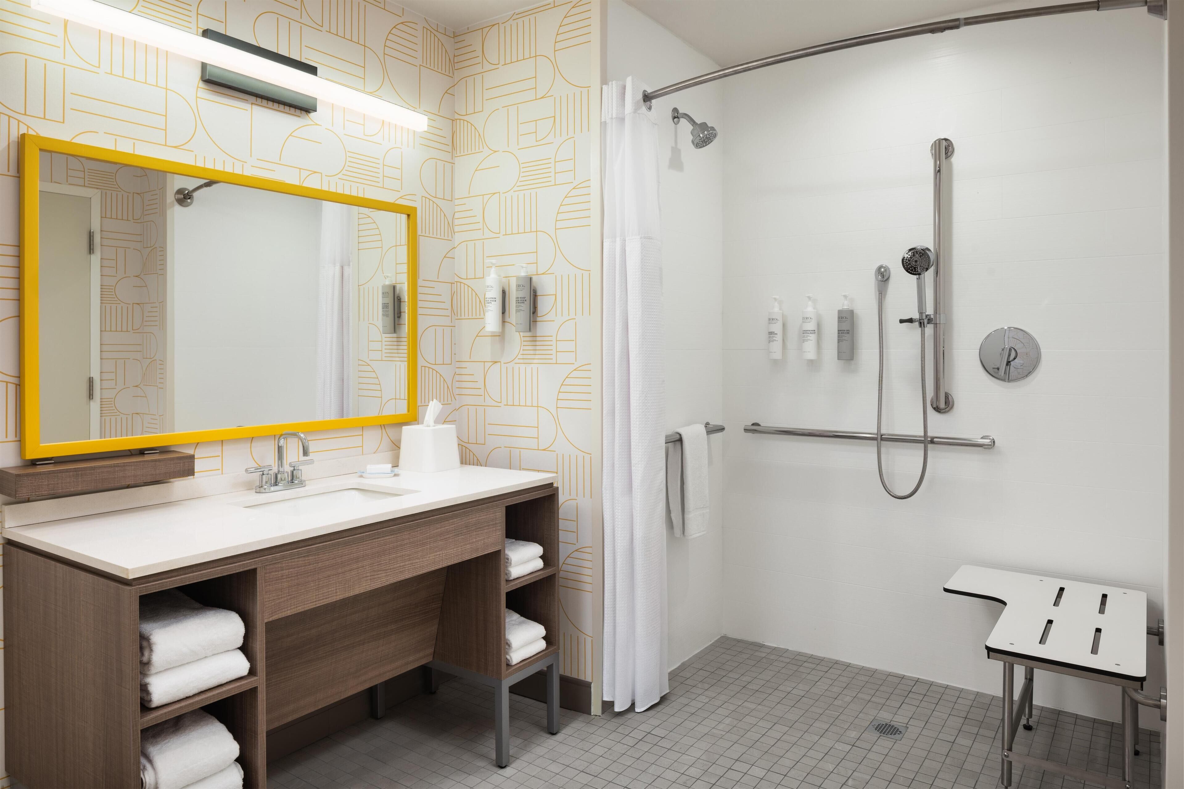 Suite, 1 King Bed, Accessible (Roll-In Shower) | Bathroom shower