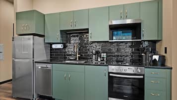 Superior Suite, 1 Queen Bed with Sofa bed, City View | Private kitchen | Full-size fridge, microwave, oven, stovetop