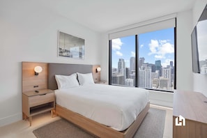 3 chambres, coffres-forts dans les chambres, fer et planche à repasser