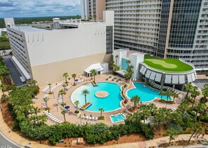 Outdoor pool, a heated pool - Modern & Spacious 5-bed condo in PCB - World's Most Beautiful Beach! (Panama City Beach)