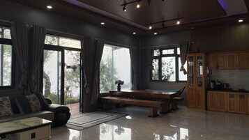 Standard Villa, 4 Bedrooms, Garden View | Living area | 60-inch Smart TV with satellite channels, fireplace