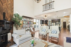 Smart TV, fireplace, foosball, books