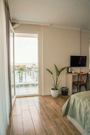 Chambre Confort, plusieurs lits, balcon, vue mer | Vue sur la plage/l’océan