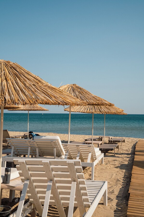 Plage privée, navette gratuite vers la plage, cabines gratuites