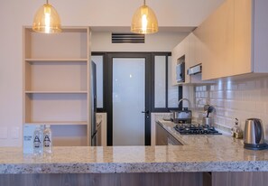 Apartment, 3 Bedrooms (301) | Private kitchen | Fridge, microwave, oven, blender - Aguirre by Wynwood House (Lima)