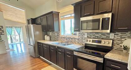 Cozy 3-bedroom lake house with private beach area and fire pit in Greenville