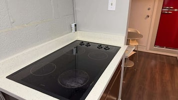 Fridge, microwave, stovetop, coffee/tea maker