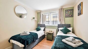 2 chambres, bureau, fer et planche à repasser, Wi-Fi gratuit