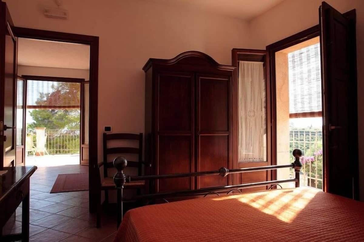 Habitación cuádruple Deluxe, vistas parciales al mar | Wifi gratis