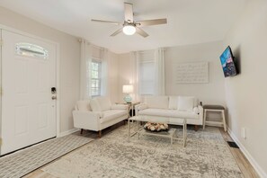 Living area - Charming 2-bedroom house with King Bed, WiFi, AC, close to Clemson, large yard. (Easley)