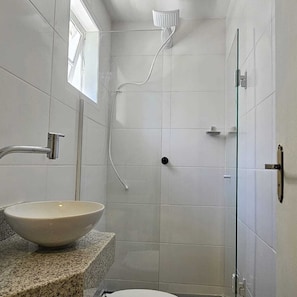 Shower, towels, toilet paper