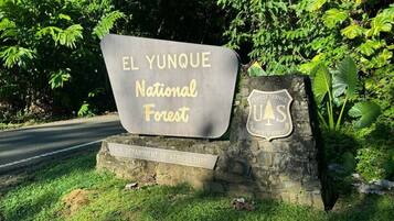 A sign for El Yunque National Forest with a logo for the U.S. Department of Agriculture.