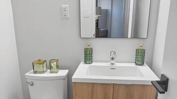 Hair dryer, towels, soap, toilet paper