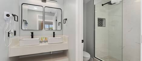 Hair dryer, towels, soap, toilet paper
