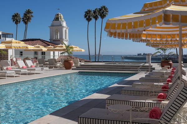 Outdoor pool, open 9:00 AM to 6:00 PM, cabanas (surcharge)