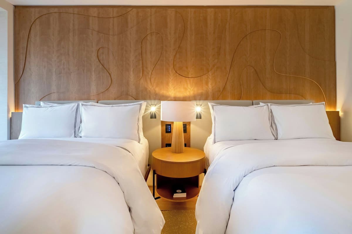 Habitación Deluxe, 2 camas dobles | Wifi gratis