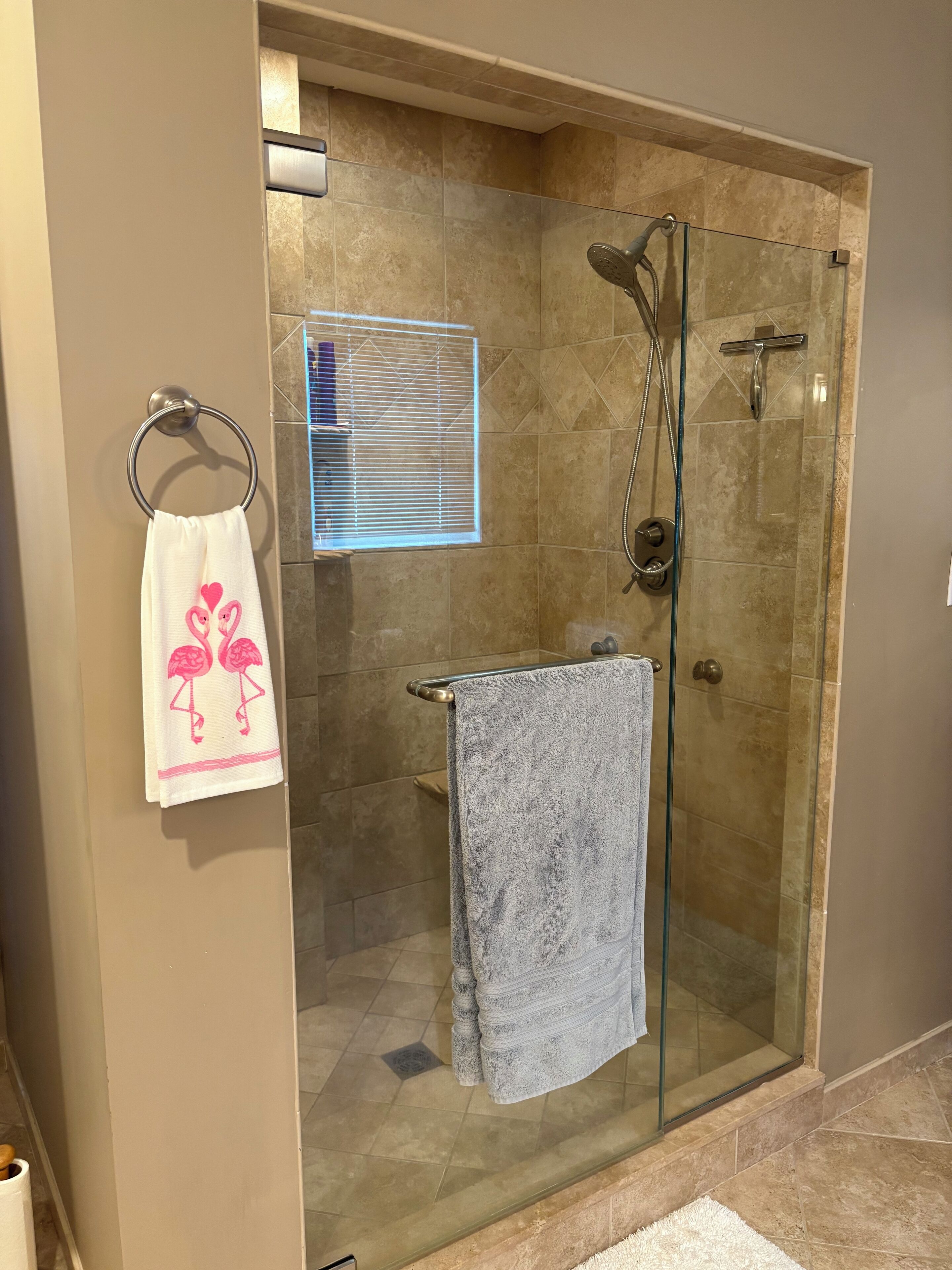 Shower, towels, soap, toilet paper