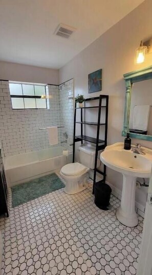 Hair dryer, towels, soap, shampoo
