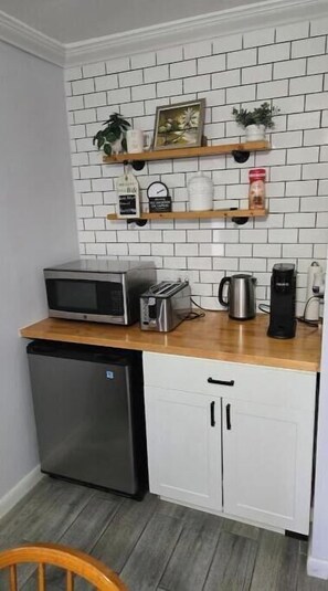 Fridge, microwave, coffee/tea maker, electric kettle