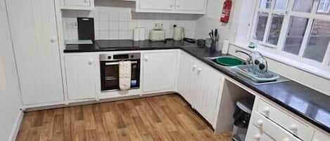 Microwave, oven, stovetop, cookware/dishes/utensils