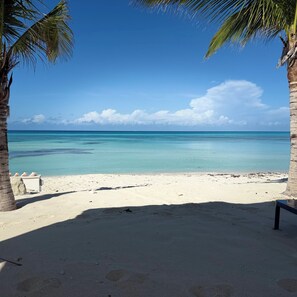 On the beach, sun-loungers, beach towels