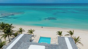 On the beach, sun loungers, beach towels