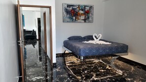 4 bedrooms, desk, iron/ironing board, travel cot