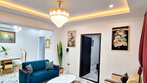 Deluxe Suite, Balcony, City View | Living area - Lutz Ville Apartments (Kumasi)