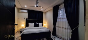 Deluxe Suite, Balcony, City View | Desk, free WiFi - Lutz Ville Apartments (Kumasi)