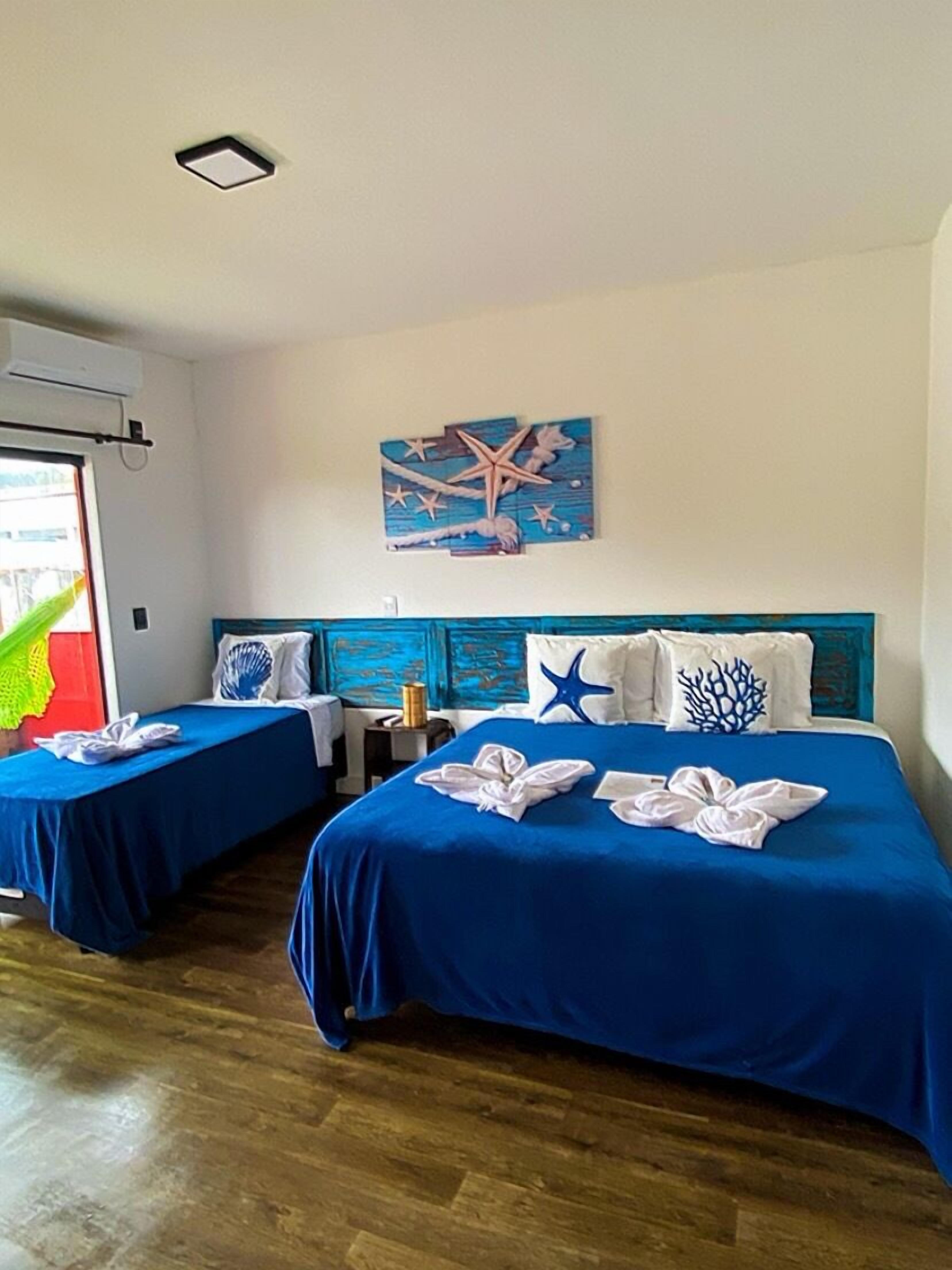 Neljän hengen perhehuone, lanai, kaupunkinäköala | Ilmainen Wi-Fi