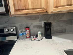 Fridge, microwave, dishwasher, coffee/tea maker