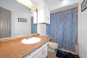 Hair dryer, towels, soap, shampoo